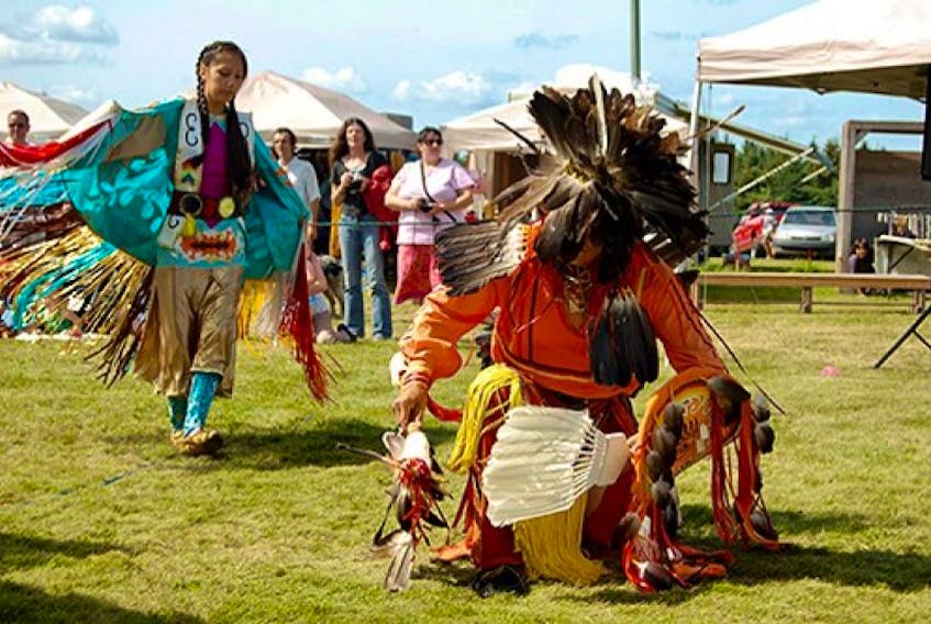 Native dancers participate in the dance circle during Sundays activities at the Abegweit Pow Wow at Panmure Island. Guardian photo by Steve Sharratt