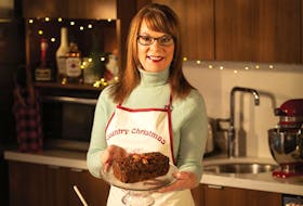 Cindy Day shows off her Bourbon Fruitcake.