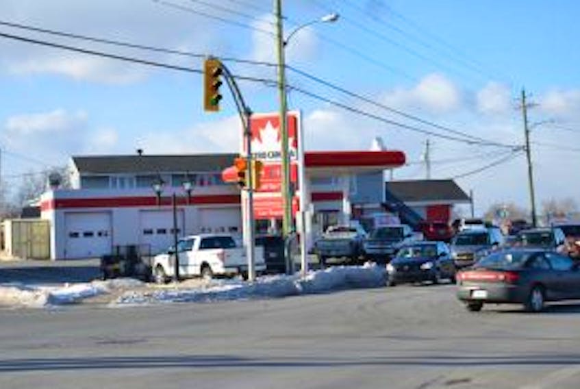 ['Police are continuing to investigate an armed robbery that occured at this Petro Canada station in Sydney Mines on Wednesday, Jan. 7.']