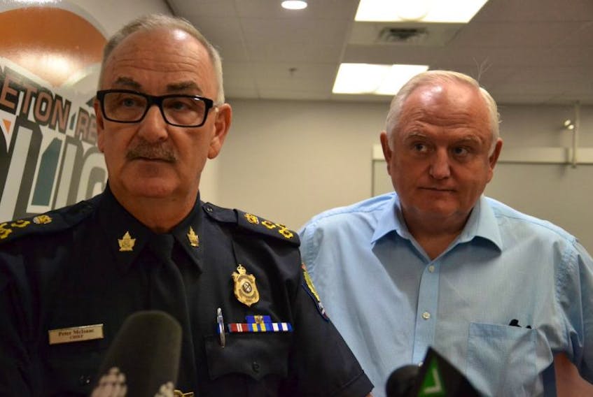 Cape Breton Regional Police Chief Peter McIsaac and Insp. Ron Donovan speak to media during a press conference on Friday, Aug. 26, 2016.