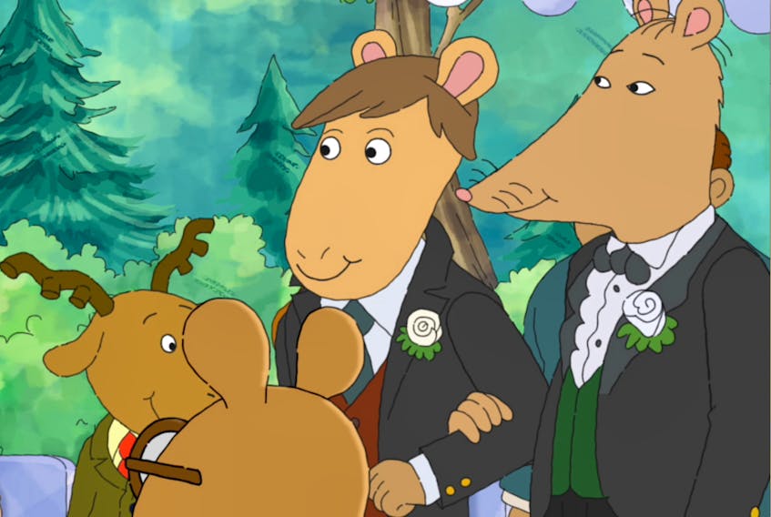 Mr. Ratburn, right, walks down the aisle with his soon-to-be husband. - PBS Kids