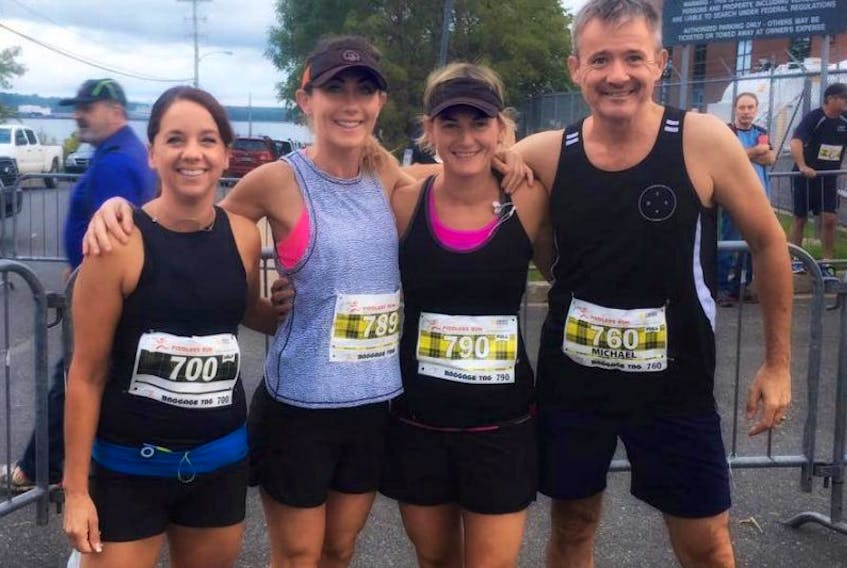Laura Peters, Heather O’Donnell, Jennifer Coolen, and Michael Peters are seen here at the Fiddlers Run in Cape Breton Sept. 10 where they ran the full marathon. O’Donnell won the race for the women. The Annapolis County runners are off to the Chicago Marathon Oct. 8.