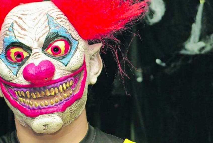 Putting on a clown mask to frighten people is ill advised, police say. 