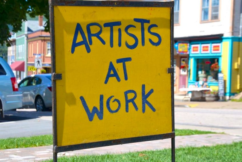 If you see signs like this in Annapolis Royal August 15 and 16, slow down for Paint the Town artists – there will be about 80 of them around the town. The annual event is a major arts council fundraiser.