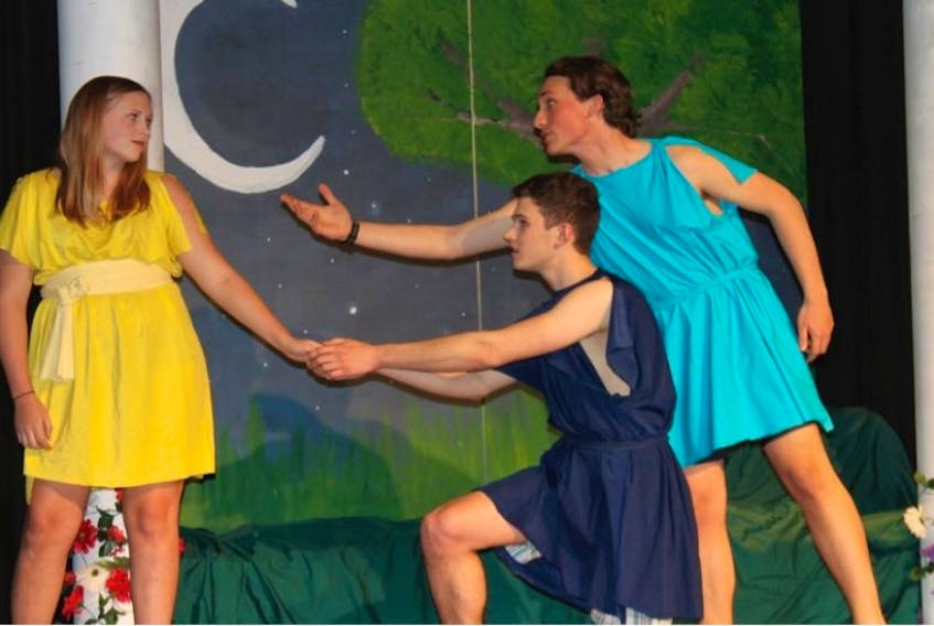Kitana Chesley as Helena pursued by Avery Jackson as Lysander and Gabriel Mutton as Demetrius in A Midsummer Night’s Dream or The Night They Missed the Forest for the Trees being performed by the BRHS Drama Club and premiering Wednesday, May 11.