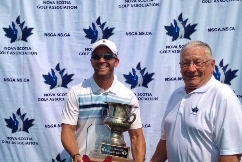 David Williamson with the Nova Scotia men's amateur trophy after winning July 11 in a playoff.