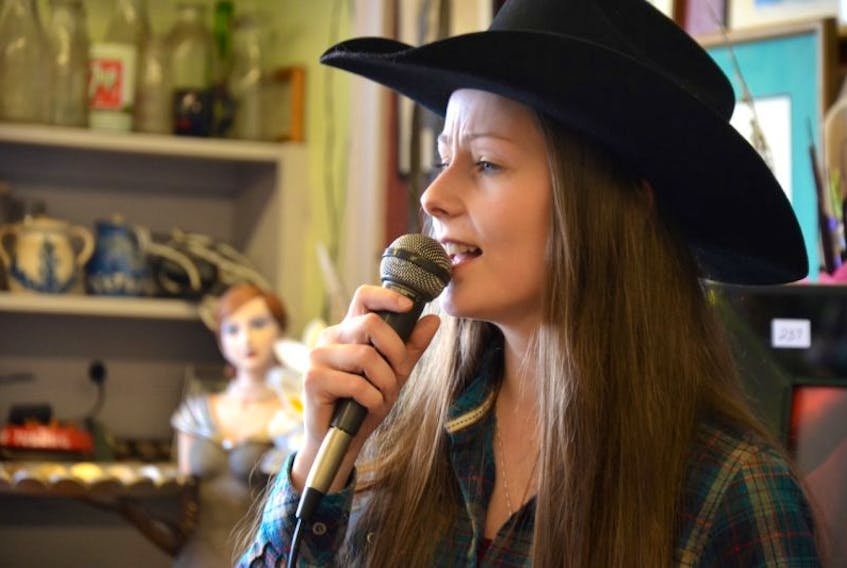 Abigail Bezanson, at 21, may will be the youngest female auctioneer in Nova Scotia. She works at Bezanson Auctioneering Center in Margaretsville with her father Rick Besanson, the Cowboy Auctioneer, and her mother Laurie Bezanson. She and brother Colton have been helping out since they were little kids.