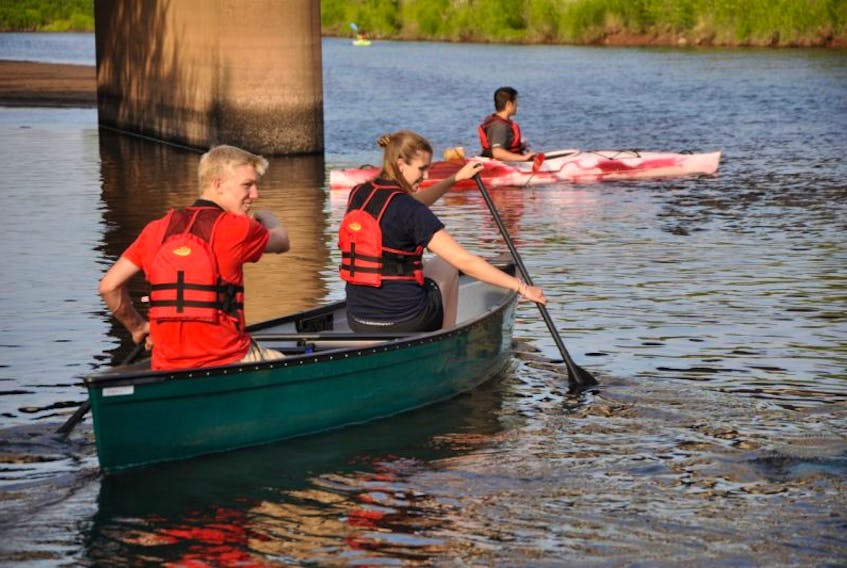 Connor McCabe and Erica Theisen head out to lead one of the free canoe and kayak tours Middleton Recreation hosts from Riverside Park at 6:30 p.m. Thursday evenings.