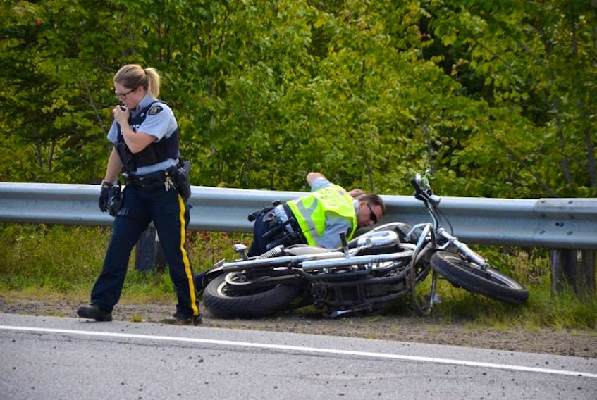 Police investigate the cause of a motorcycle crash on Highway 101 late this afternoon just west of the Centrelea exit near Bridgetown. A woman was taken to hospital in Middleton.