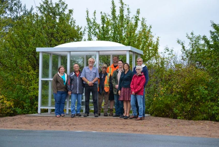Members of the Village of Lawrencetown village commission, village staff, and the Lawrencetown Lions Club gathered Oct. 1 to cut the ribbon on Lawrencetown’s first bus shelter. Two more are being considered as funding becomes available.