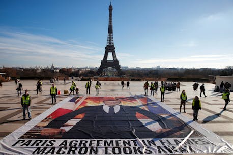 At home of climate accord in Paris, campaigners demand action