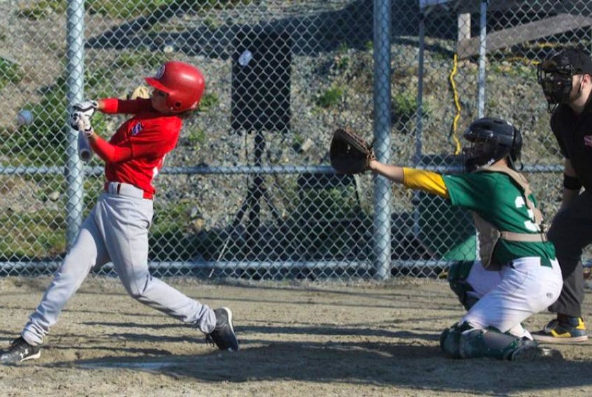 Cole Hillier of the St. John’s Capitals takes a cut during the Atlantic AA bantam baseball championship at the Airport Heights Ball Field in St. John’s on Saturday. The host Capitals finished 1-2 in the tourney, which was won by Shelburne, N.S..
