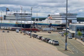 Vehicles are shown lined up at the Marine Atlantic terminal in North Sydney on Friday. More than 30 vehicles were preparing to board Marine Atlantic’s MV Blue Puttees for the 11:45 a.m. crossing, the first since the opening of the Atlantic bubble Friday. JEREMY FRASER/CAPE BRETON POST