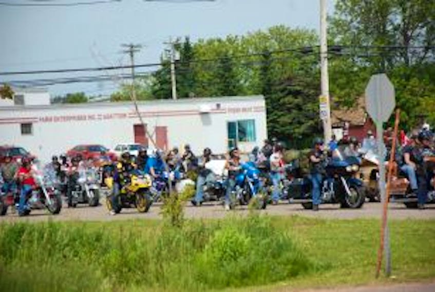 ['Motorcyclists from across Canada and the U.S. line up at Credit Union Place for the closing Parade of Iron Horses for the 2014 Atlanticade event. An estimated 4,000 people took part in this year’s event.&nbsp;']