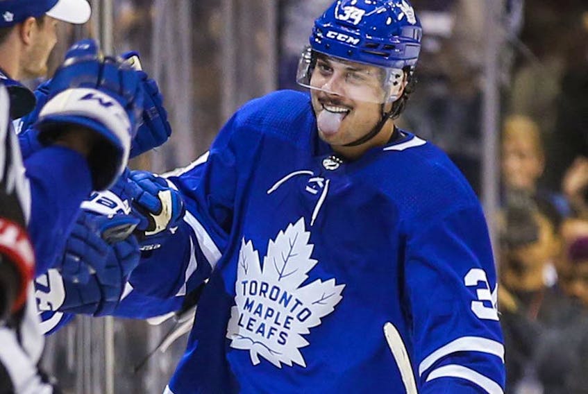 Maple Leafs forward Auston Matthews celebrates his second goal of the game against the Senators during second period NHL action at the Scotiabank Arena in Toronto on Wednesday, Oct. 2, 2019.