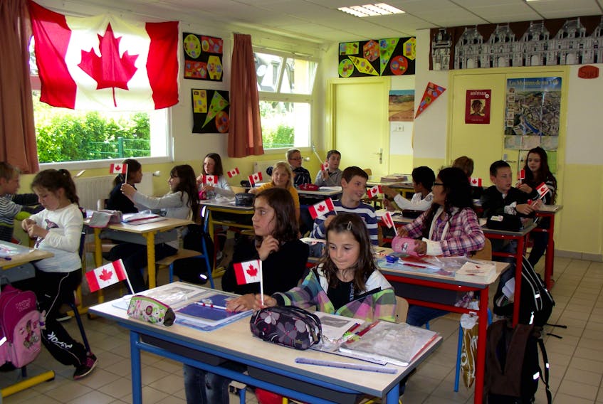 Elementary school students attend a class at École Bill Baillie in Authie, France.
