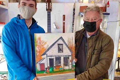 Autistic painter presents Great Village antiques dealer with painting of shop