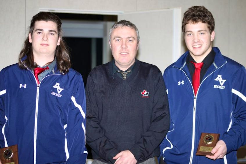 <p>Avon View boys' hockey head coach Mark Tye, centre, poses with the team's two Coaches Award winners for 2014-15: Peter MacDougall, left, and Luke Jillett. The presentation was held at the VHSHL boys' division awards banquet April 7 in Berwick.</p>