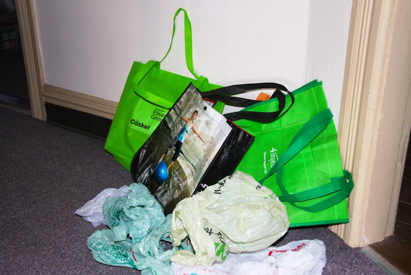 While a ban on plastic shopping bags is being considered, the encouragement to use reusable bags when shopping continues to be voiced.