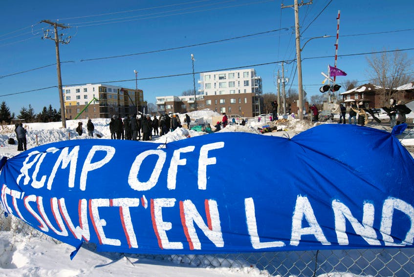 Supporters of the indigenous Wet'suwet'en Nation's hereditary chiefs at a railway blockade in St. Lambert, Que., Feb. 20, 2020.