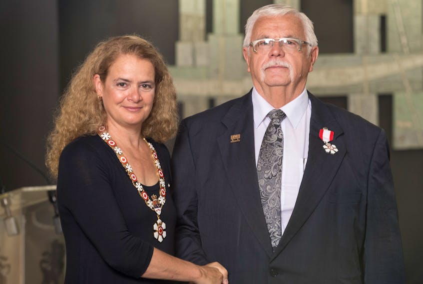 Former Summerside mayor, Basil Stewart, is congratulated on his investiture into the Order of Canada by Governor General Julie Payette. Stewart received his medal at a ceremony in Quebec City, Thursday.