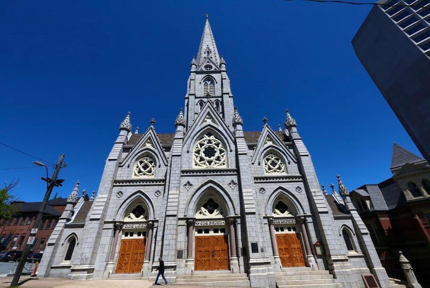 A man walks past St. Mary's Cathedral Basilica on Spring Garden Road in Halifax on Wednesday, June 17. A settlement in a class action suit launched on behalf of alleged victims of sexual abuse by priests could cost the Halifax-Yarmouth Archdiocese millions of dollars.
ERIC WYNNE/Chronicle Herald
