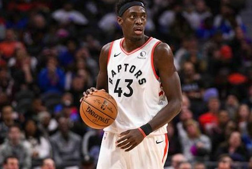 Toronto Raptors forward Pascal Siakam controls the ball against the Detroit Pistons during a game at Little Caesars Arena. 