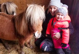 Nicole Glover is a busy woman carrying for daughter Kaleya Cook while running two businesses, Black Feather Equine and The Blue Bathtub, in Reidville. 