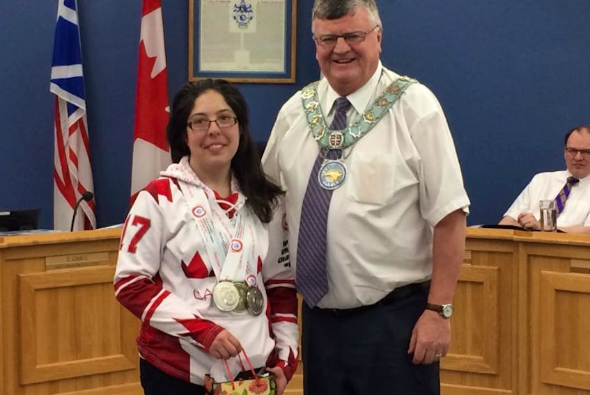 To honour Gander Special Olympian Floressa Harris for her recent success at the World Special Olympics – two silver and a bronze – in Austria, Mayor Claude Elliott presented Harris with a gift from the town for her outstanding performance.