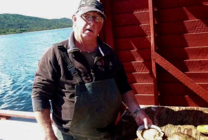 Larry Bailey, 83, has been scalloping fishing since 1950. Given the revision to the recreational scallop license, Bailey hasn’t even put his boat in the water due to a fear of being fined.
