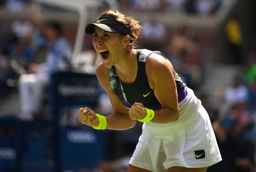 Switzerland’s Belinda Bencic celebrates after winning her quarterfinal match against Donna Vekic of Croatia on Wednesday
at the U.S. Open in New York. Bencic, seeded 13th, is the last remaining Swiss player in the tournament. (GETTY IMAGES)