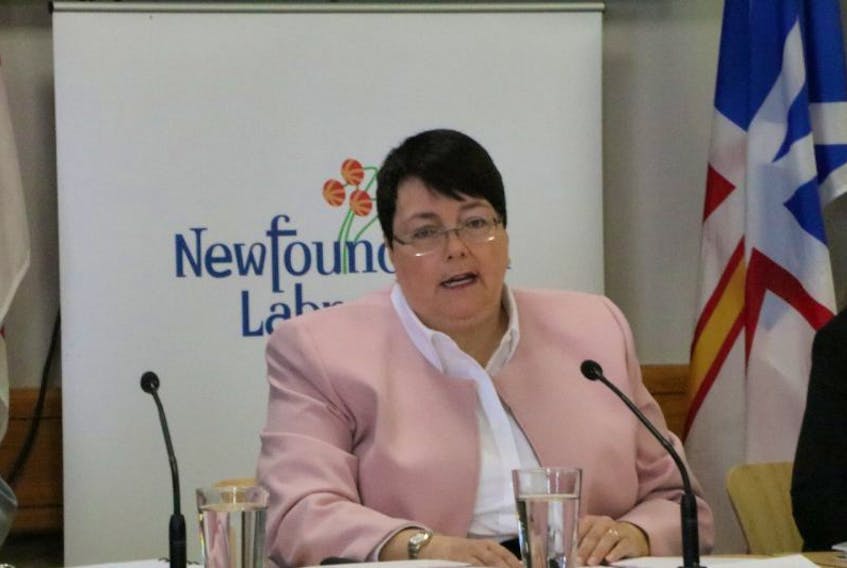 Finance Minister Cathy Bennett addresses members of the media at the media lockup prior to delivering her speech in the House of Assembly. 
