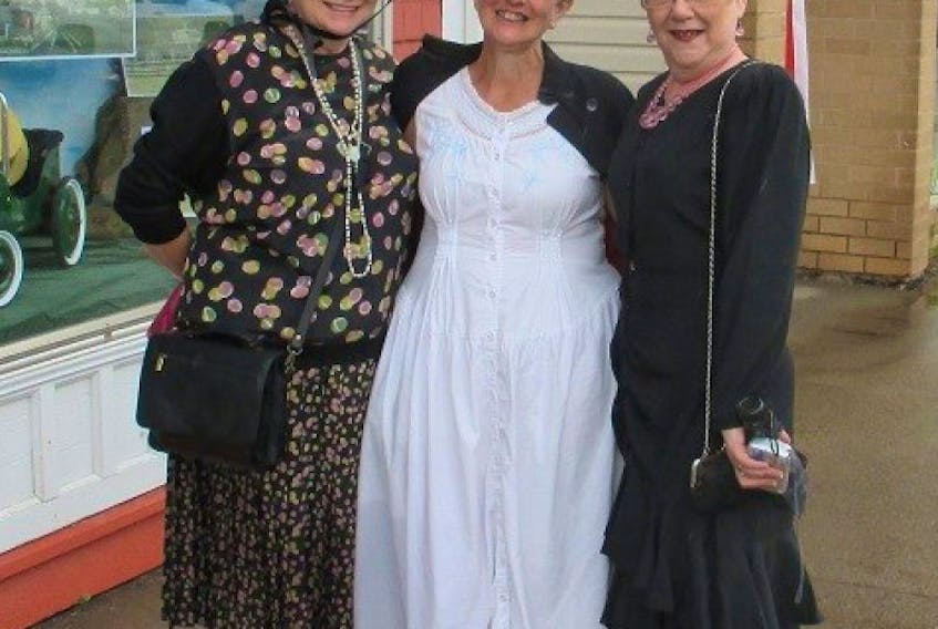 Despite the rain, the Apple Capital event on June 16, headed by John Eaton, was amazing and a great number of people attended.&nbsp;Many were dressed in 1920s-period costumes, including Janice Wentzell, left, Marianne Franey and Carol Doherty. - Submitted