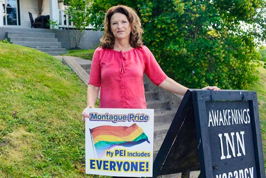 <p>Betty Woodpage wants everyone to know they’re welcome at the Awakenings Inn in Montague. Woodpage is one of several business owners who’ve shown support for the LGBT community in the town with signs or flags showing the rainbow.</p>