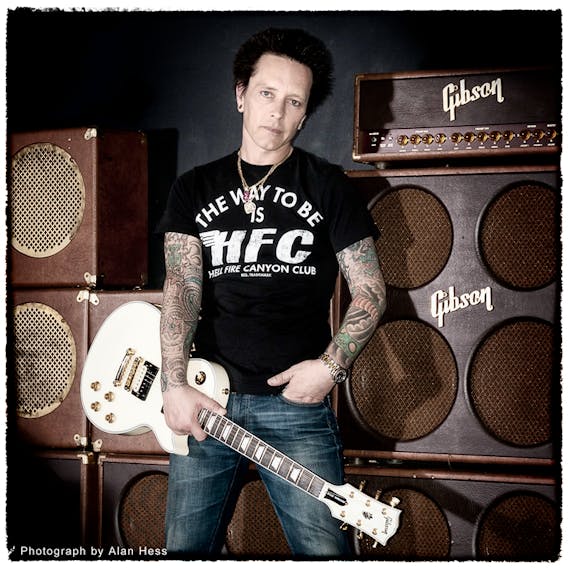 Billy Idol guitarist Billy Morrison is shown with his limited edition signature Gibson Les Paul guitars, one of which was stolen from Chester resident Mike Dockrill on Tuesday.