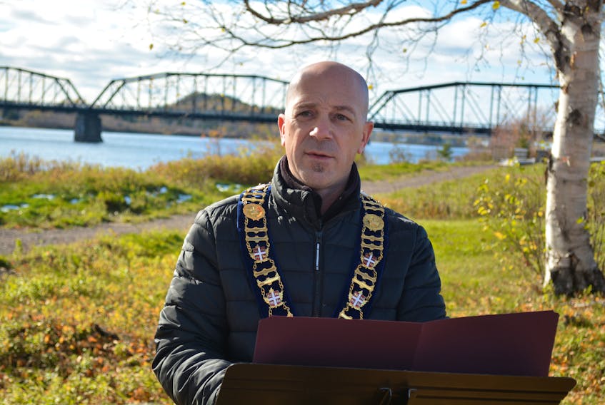 Bishop’s Falls Mayor Bryan King announces funding for the continuation of the town’s Exploits River development strategy Friday on Riverside Drive. Nicholas Mercer/SaltWire Network 