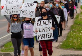 More than 50 people participated in a Black Lives Matter rally and walk along Reeves Street in Port Hawkesbury on Saturday. Those in attendance held signs during the event. The rally comes following the death of George Floyd, an African American man who was killed by police during an arrest in Minneapolis, Minn., on May 25. The rally/walk was organized by Sasha Repko. CONTRIBUTED/ROB SMITH