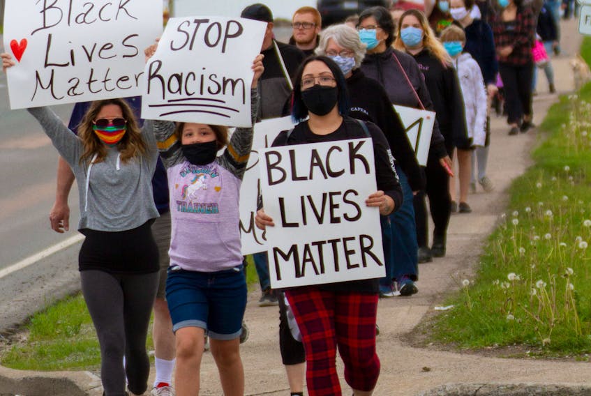 More than 50 people participated in a Black Lives Matter rally and walk along Reeves Street in Port Hawkesbury on Saturday. Those in attendance held signs during the event. The rally comes following the death of George Floyd, an African American man who was killed by police during an arrest in Minneapolis, Minn., on May 25. The rally/walk was organized by Sasha Repko. CONTRIBUTED/ROB SMITH