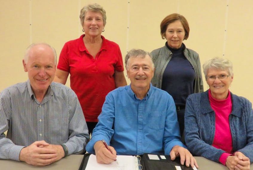 <p>Members of the Summerside Bluegrass and Acoustic Music Association met recently to finalize the plans for their annual bluegrass festival Nov. 4-6 at the Causeway Bay Convention Centre in Summerside. Volunteers on the planning committee are, front from left, Dave Tingley, president, John Campbell and Audrey Barlow and standing, Jean Tingley and Mim Murphy.</p>