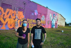 Artists Melissa Francis (left) and Marshall Borland recently finished a mural in Botwood thanking essential workers for their work during the COVID-19 pandemic. Nicholas Mercer/SaltWire Network 