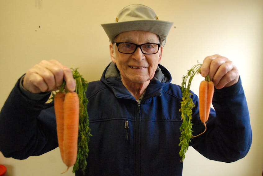 Fred Bittner dangling the “double carrots.”