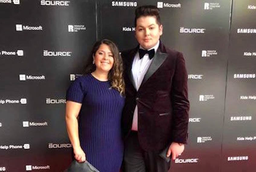 Hooper and Constantina Ellinas, communications manager for Kids Help Phone on the red carpet for a premiere at the Roy Thomson Hall in Toronto. CONTRIBUTED