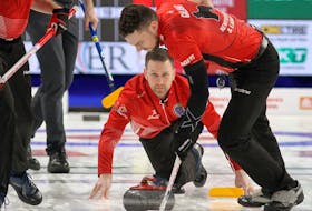 Newfoundland and Labrador skip Brad Gushue throws a rock as Brett Gallant sweeps against Alberta during the 2020 Tim Hortons Brier final in Kingston, Ont., on Sunday, March 8, 2020.