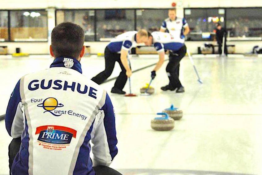 In this file photo, Brad Gushue watches as Mark Nichols and Brett Gallant sweep a shot by lead Geoff Walker during play in the 2016 Tankard provincial men’s curling championship at the Re/Max Centre in St. John’s. After two years away from Tankard competition as Team Canada, Gushue and his teammates return to play for the title in the 2020 Newfoundland and Labrador men’s championship, beginning today at the Re/Max Centre. — Telegram file photo/Keith Gosse