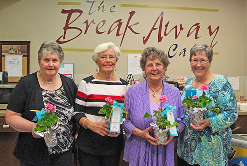 Margie Pitts (left), Marius Langley, Margo Turner and Judy MacKenzie are four of the 20 people who have volunteered at The Breakaway Café in St. Martha’s Regional Hospital since it opened 10 years ago. Corey LeBlanc