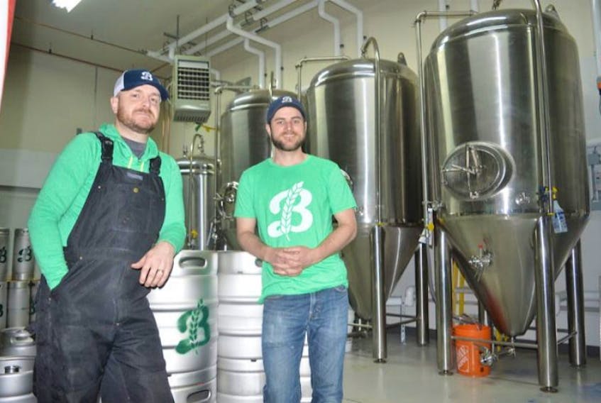 Andrew Morrow, left, and Bryan MacDonald, are the co-owners of Breton Brewing Co. on Keltic Drive. The microbrewery opens on Saturday.