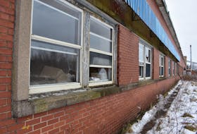 Shattered windows serve as a reminder of the mischief that has played a part in the current owner walking away from the former Britex plant. – Ashley Thompson