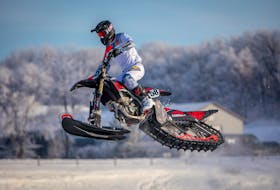 Mitch Cooke isn't exactly easing into the world of snowbike racing. The 36-year-old from Brookfield will compete against the best in the world this weekend at X Games Aspen in Colorado. KGK PHOTOGRAPHY