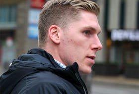 Former Mount Royal hockey captain Matthew Brown leaves the Calgary Courts Centre. Brown is accused of attacking an MRU professor in her Springbank Hill home last year. Tuesday, November 12, 2019. 