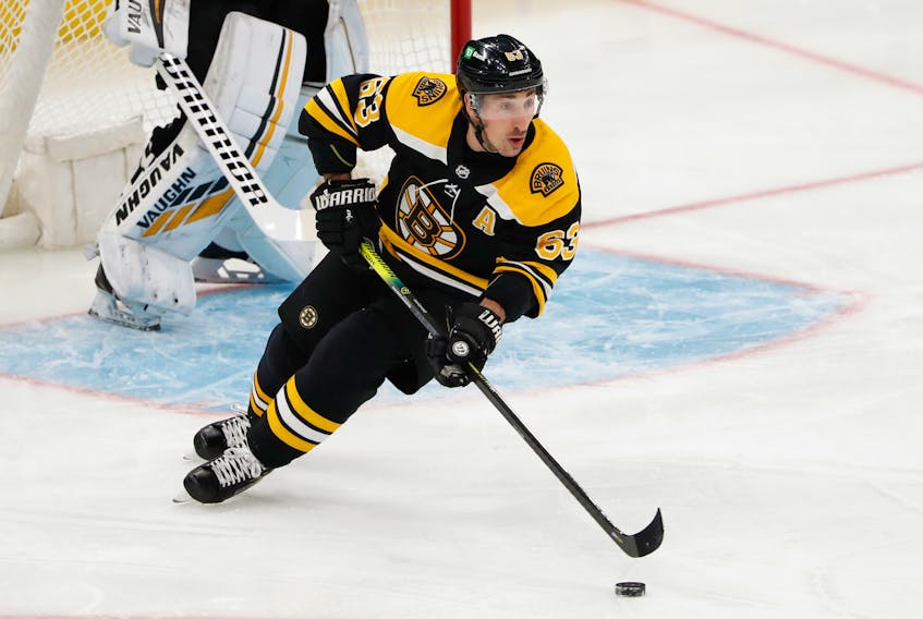 Boston Bruins forward Brad Marchand (63) skates with the puck during a game earlier this month against the New Jersey Devils. The Hammonds Plains star has been placed on the NHL's COVID-19 protocol list. - Winslow Townson / USA Today Sports